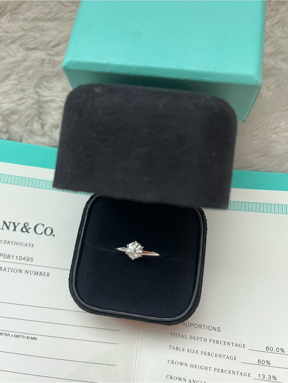 Tiffany & Co. Silver Solitaire Ring with Central Diamond